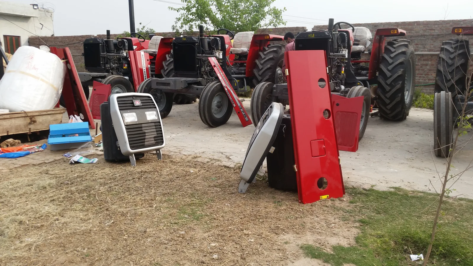 Tractor shipment preparation yard with tractors and export parts